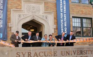 Former Chancellor Nancy Cantor cuts the ribbon to open Institute for Veterans and Military Families, which is housed in the David B. Falk College of Sport and Human Dynamics, at Syracuse University