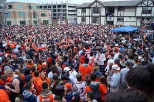 Hundreds of Syracuse University students gathered at Castle Court before the SU men's basketball team played in the Final Four against the University of North Carolina on Saturday.