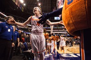 Maggie Morrison was all smiles as she walked off the court celebrating Syracuse's 80-59 win over Washington in the national semifinals. 
