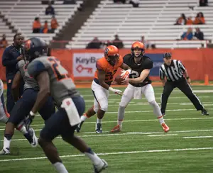 Eric Dungey (2) threw for 296 yards on 27-for-33 passing in Saturday's spring game.