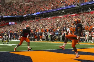 Brisly Estime (right) scored a touchdown against South Florida and will be key for Syracuse's offense against Connecticut. 
