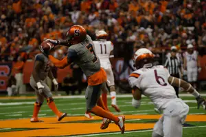 Ervin Philips makes a grab against Virginia Tech on Saturday. He led the Orange with 139 receiving yards.