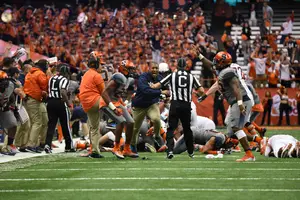 Syracuse's defense picks up a fumble after it gained a 31-17 lead on No. 17 Virginia Tech. The Orange's defense had one of its best games of the year. 