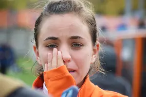 Jessica Vigna rubs her eyes on Sunday at SU Soccer Stadium. The Orange was eliminated from ACC tournament contention.