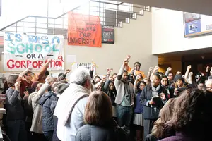 Students in THE General Body protest inside Crouse Hinds Hall in November 2014.