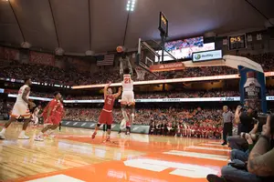 Syracuse used its height advantage and a comfortable new spot on the floor to create scoring opportunities and acrobatic plays like this, from senior forward Tyler Roberson.