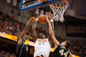 Tyler Roberson has seen a surge in playing time of late. Above, the forward grabs a rebound against the Demon Deacons in a previous outing inside the Carrier Dome. 