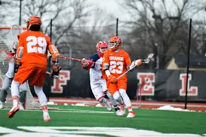 Nick Mariano (23) had two goals and three assists on the day for Syracuse 