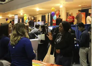 Syracuse University students attend a career fair at the Martin J. Whitman School of Management. Fairs provide an opportunity for obtaining information that can pertain to students' short and long term plans