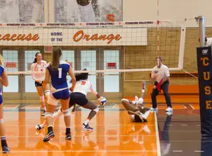 After winning the first set Friday night, 25-21, the Orange lost three in a row: 25-14, 25-22, and 25-13.
