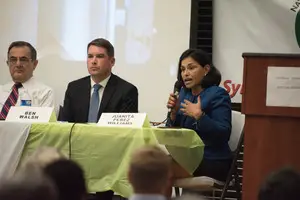The two front-runners, Juanita Perez Williams and Ben Walsh, during a televised debate clashed Tuesday night over campaign contributions.