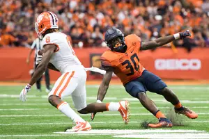 Parris Bennett attempts to make a play in Syracuse's upset of No. 2 Clemson.