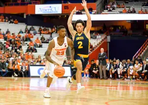 With Geno Thorpe sitting due to injury, Frank Howard led the way from the point guard position for SU Wednesday night.