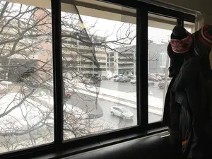 The student fell out of a second-floor window in Brewster Hall and landed in snow outside.