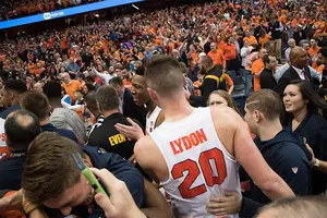 Syracuse fans stormed the court last year in wins over Duke, Florida State and Virginia. Experts say that the Orange fans shouldn't do it again should SU beat North Carolina.