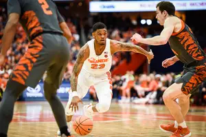 Frank Howard drives to the rim against Clemson. The Orange got hot and stayed hot in its win.