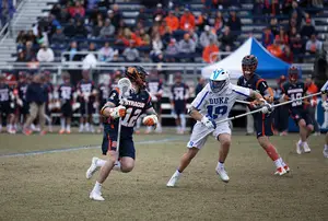 Jamie Trimboli (12) finished off the game for the Orange with a goal off a groundball.