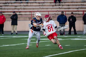Jeff Teat tallied two goals and four assists for a game-high six points, and Cornell overcame Syracuse's at-times locked in defense to win.
