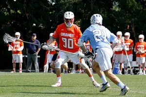 Austin Fusco (90) featured on a Syracuse team that split with the Tar Heels a season ago. Fusco now wears the coveted No. 11.