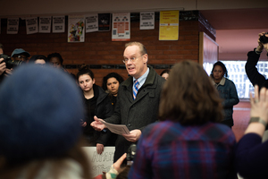 Syracuse University members organized a sit-in at Schine Student Center.
