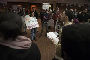 SU students presented a list of demands to Chancellor Kent Syverud at Schine Student Center on Friday morning.
