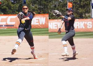 Miranda Hearn (right) who pitches and plays infield often wears a visor while Alexa Romero (left) doesn't. 