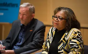 Dean Lorraine Branham (right) spoke during a forum in the Joyce Hergenhan Auditorium on Tuesday at the S.I. Newhouse School of Public Communications.