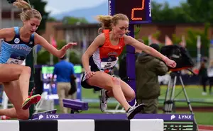 Paige Stoner running the Steeplechase. She's been one of SU's top contributors in the event this year.