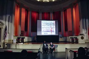 Priya Penner (left), president of Syracuse University's Disability Student Union, and Jennith Lucas, DSU's vice president, led the Disability Caucus and Campus Conversation in Hendricks Chapel on Monday night. 