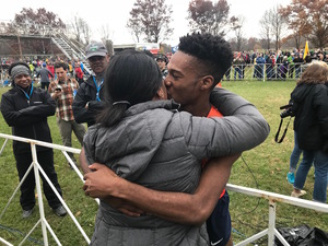 Justyn Knight, who graduates from SU on Mother’s Day, embraced his mom, Jennifer, after winning the 2017 cross country national title. He said his mother is his best friend. 
