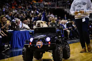Jack the Bulldog, Georgetown's mascot, rides in a mini jeep during a break of last year's 86-79 Syracuse win in overtime.