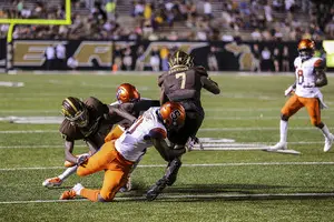 Trill Williams tackles a Western Michigan ball carrier on Friday.