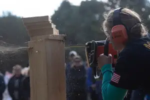 Heather Morris, a member of the Woodsmen, competes in the 