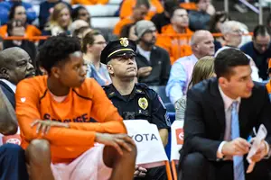 Andrew Clary, a Syracuse DPS officer, sits behind the Orange bench during every game SU plays.