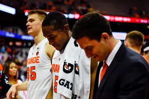 Jalen Carey walks off the court. He made his Syracuse debut Tuesday.
