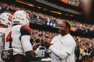 Dino Babers, pictured earlier this season against Notre Dame, led Syracuse to 10 wins in 2019. 
