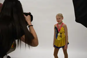 Austynn Willson, 9, has been figure skating since last year and competes in the Special Olympics. Athletes and coaches from New York state held a photoshoot at Light Work on Sunday in support of the Spread the Word to End the Word campaign.