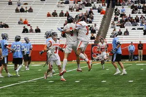 Syracuse celebrates after a goal in last week's win over Johns Hopkins.