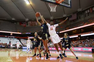 Syracuse guard Gabrielle Cooper battles for a rebound in Syracuse's win over Pitt earlier this season.
