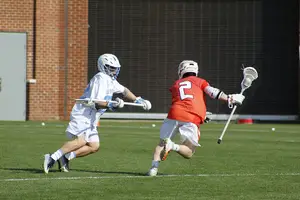 Griffin Cook tries to dodge a defender down the field.