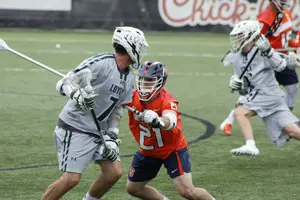 Nick Mellen guards Loyola's Pat Spencer in Saturday's loss to the Greyhounds. 