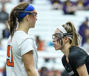 Nell Copeland face-guards Emily Hawryschuk in February. 