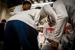 Syracuse huddles before its lone NCAA tournament game last season.