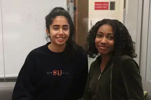 SU students Nikita Chatterjee (left) and Brianna Howard created a water filtration system using the traditional sari.
