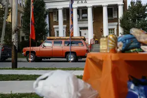 Mike Sheehan's orange truck is parked outside of the Delta Delta Delta sorority before each SU home game. 