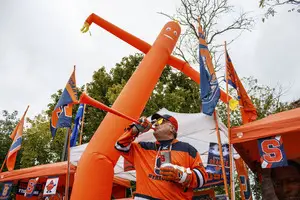 “That’s what happens when you get drunk and go on Amazon,” Brian Haessig said about the inflatable human tube that highlights the tailgate on the south lot of University Ave. 