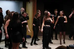 Co-ed Jewish a cappella group Oy Cappella performed its fall invitational Thursday night. A hate crime involving a swastika etched in snow near campus was reported three hours prior.