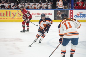 Lauren Bellefontaine (center) tallied three points with two goals and an assist in the Orange's scoring outburst against Lindenwood.