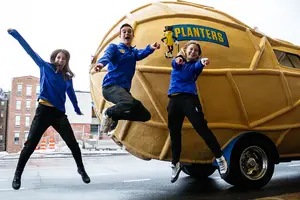 Maggie Chandler (left), Danny Higgins (middle), Stephanie Lerner (right), are the crew members that ride across the country in the NUTmobile, a peanut-shaped car promoting the Planters brand. 