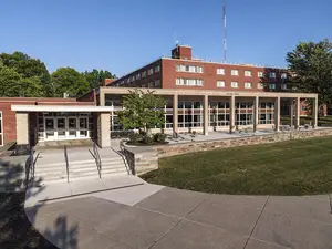 Syracuse University's Flint Hall (above) and Graham Dining Center are located next to each other on the Mount.